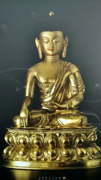 Statue of Buddha with a geometrically derived cross on the arm
